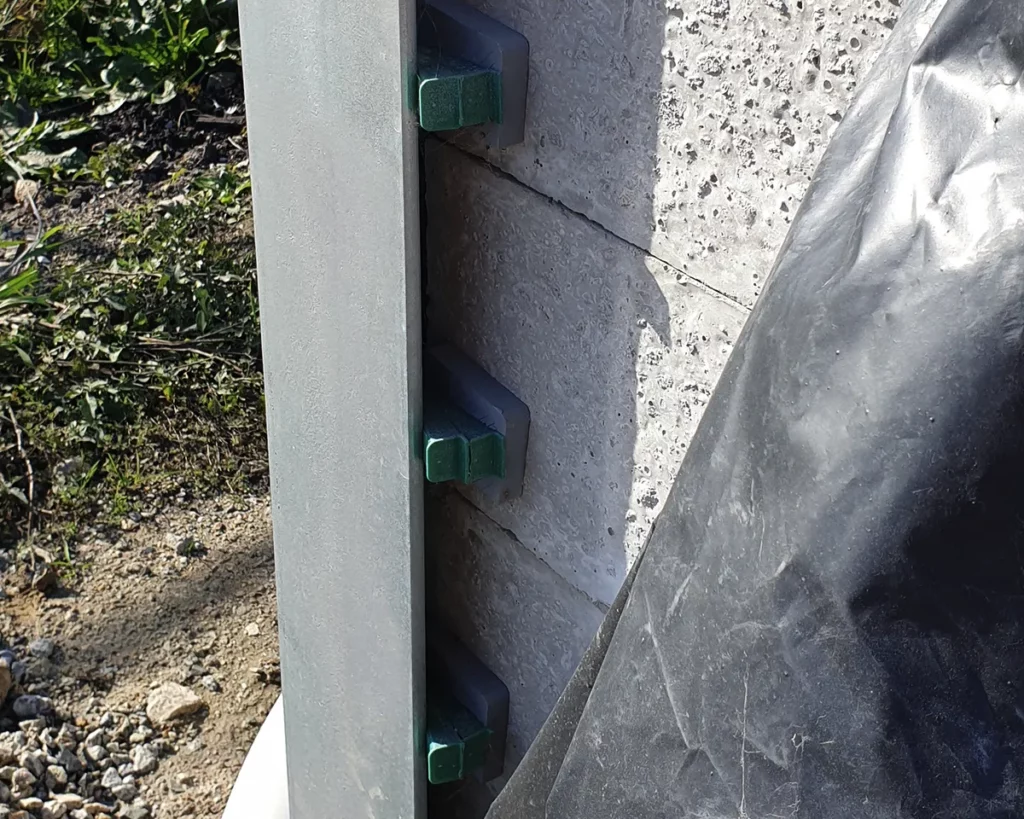 Retaining Wall Plastic Wedges in Retaining Wall by Sunset Sleepers