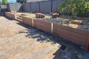 Sunset Sleepers The Malibu Wood Grain Jasper Brown Concrete Sleepers on a Backyard Retaining Wall in a Melbourne Project