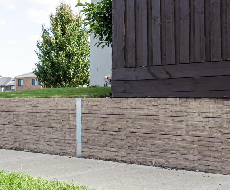 Jasber Brown Stackedstone Concrete Sleepers Used as Under Fence Plinth for Timber Fence Project across Melbourne and Victoria by Sunset Sleepers