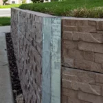 45 Degree Galvanised Steel Angle Posts featuring Jasper Brown Manhattan Stacked Stone Concrete Sleeper by Sunset Sleepers