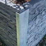 90 Degree Right Angle Corner Galvanised Steel Post featuring Charcoal Manhattan Stacked Stone Concrete Sleeper by Sunset Sleepers