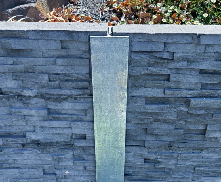 H Channel Middle Joiner Galvanised Steel Post featuring Charcoal Brown Manhattan Stacked Stone Concrete Sleeper by Sunset Sleepers