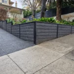 Jamesco Group Newley Built Retaining Wall in Melbourne using Charcoal Arizona Block Face Concrete Sleepers Supplied by Sunset Sleepers