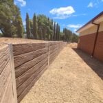 Jamesco Group Newley Built Retaining Wall in Melbourne using Jasper Brown Malibu Woodgrain Concrete Sleepers Supplied by Sunset Sleepers