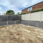 25m x 1m Charcoal Manhattan Retaining Wall – Endeavour Hills by Ferguson Landscape & Design and Supplied by Sunset Sleepers