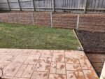 Backyard Boundary Retaining Wall Built by Dream View Landscape Using Jasper Brown Malibu Woodgrain Concrete Sleepers and Supplied by Sunset Sleepers