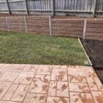 Backyard Boundary Retaining Wall Built by Dream View Landscape Using Jasper Brown Malibu Woodgrain Concrete Sleepers and Supplied by Sunset Sleepers
