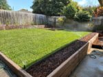 Backyard Retaining Wall Constructed by Dream View Landscape Using Jasper Malibu Woodgrain Concrete Sleepers and Supplied by Sunset Sleepers