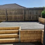 Backyard Steps Feature Retaining Wall Using Sandstone Yellow Arizona Block Face Concrete Sleepers Constructed by Dream View Landscape and Supplied by Sunset Sleepers