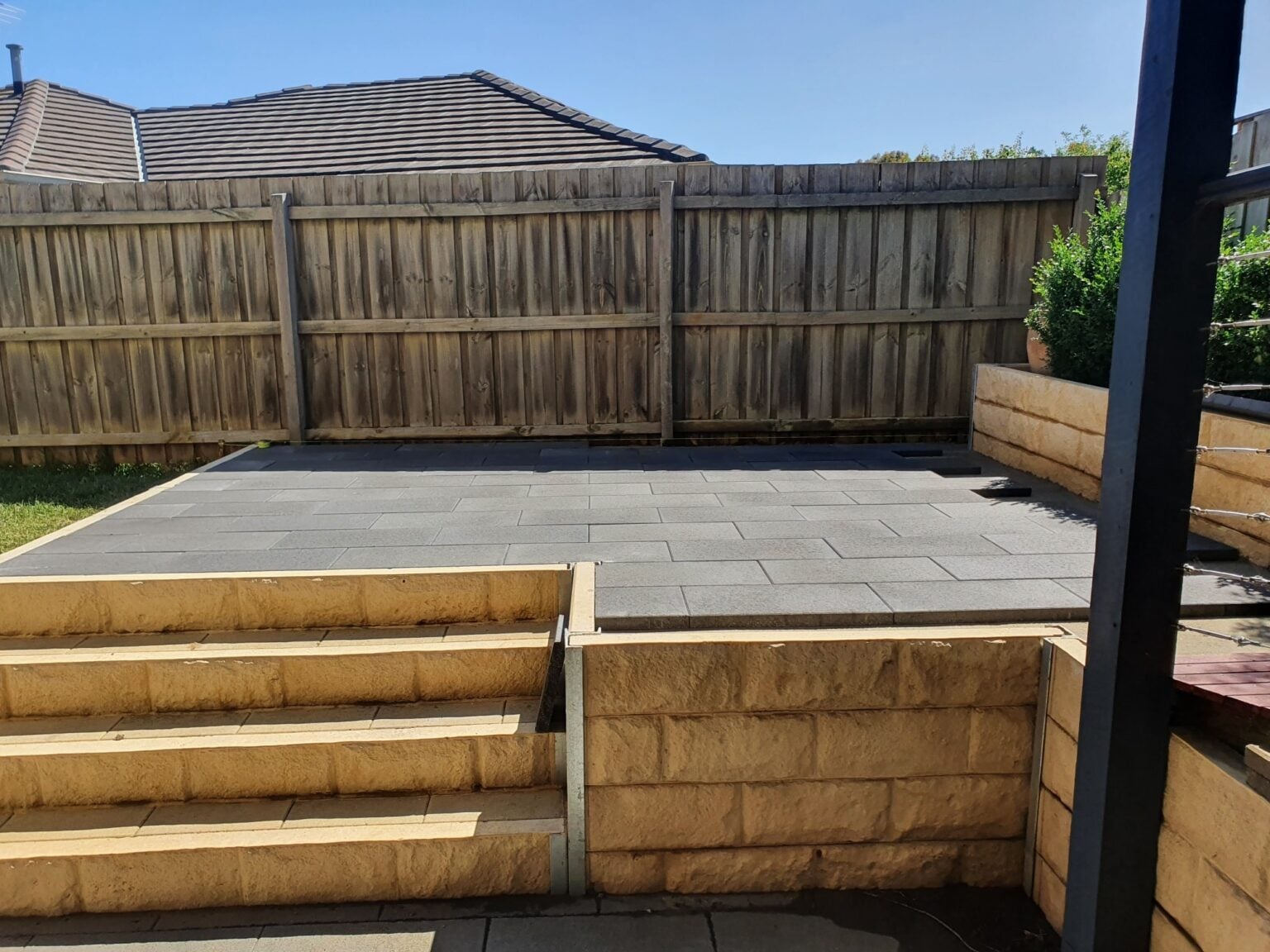 Backyard Steps Feature Retaining Wall Using Sandstone Yellow Arizona Block Face Concrete Sleepers Constructed by Dream View Landscape and Supplied by Sunset Sleepers