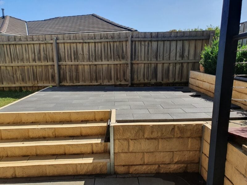 Backyard Steps Feature Retaining Wall Using Sandstone Yellow Arizona Block Face Concrete Sleepers Constructed by Dream View Landscape and Supplied by Sunset Sleepers