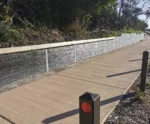 Charcoal Malibu Woodgrain Concrete Sleepers Installed on a Large Civil Retaining Wall Project Inverloch Council and Supplied by Sunset Sleepers