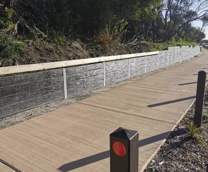 Charcoal Malibu Woodgrain Concrete Sleepers Installed on a Large Civil Retaining Wall Project Inverloch Council and Supplied by Sunset Sleepers