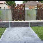 Completed Backyard Garden Bed Feature Retaining Wall by Dream View Landscape Using Charcoal Malibu Woodgrain Concrete Sleepers and Supplied by Sunset Sleepers
