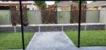 Completed Backyard Garden Bed Feature Retaining Wall by Dream View Landscape Using Charcoal Malibu Woodgrain Concrete Sleepers and Supplied by Sunset Sleepers