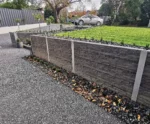 Completed Drive Way Retaining Wall Project in Melbourne Using the Charcoal Manhattan Stacked Stone Concrete Sleepers Supplied by Sunset Sleepers