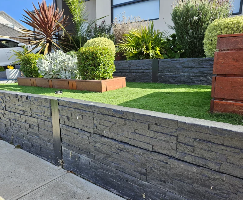 Completed Front Yard Garden Bed Project Using the Charcoal Manhattan Stacked Stone Concrete Sleepers Finished of with the Auseal EC25 Bluestone Charcoal Sealer