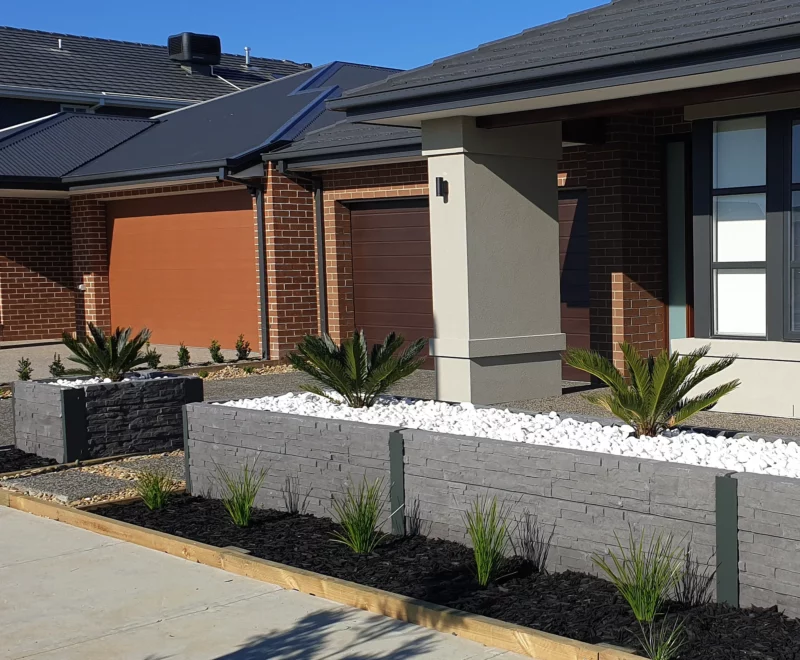 Completed Front Yard Garden Bed Project in Melbourne Using the Charcoal Manhattan Stacked Stone Concrete Sleepers Supplied by Sunset Sleepers