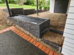 Completed Garden Bed Retaining Wall by Dream View Landscape Using Charcoal Manhattan Stacked Stone Concrete Sleepers and Supplied by Sunset Sleepers