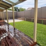 Completed Small Backyard Retaining Wall Built by Dream View Landscape Using Jasper Malibu Woodgrain Concrete Sleepers and Supplied by Sunset Sleepers