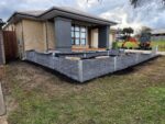 Front Yard Retaining Wall Built Dream View Landscape Using Charcoal Manhattan Stacked Stone Sleepers and Supplied by Sunset Sleepers