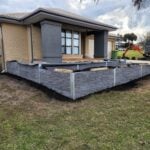 Front Yard Retaining Wall Built Dream View Landscape Using Charcoal Manhattan Stacked Stone Sleepers and Supplied by Sunset Sleepers
