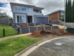 Newly Built Front Yard Retaining Wall Feature by Dream View Landscape Using Charcoal Arizona Block face Concrete Sleepers and Supplied by Sunset Sleepers
