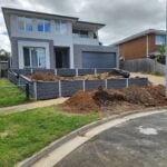 Newly Built Front Yard Retaining Wall Feature by Dream View Landscape Using Charcoal Arizona Block face Concrete Sleepers and Supplied by Sunset Sleepers