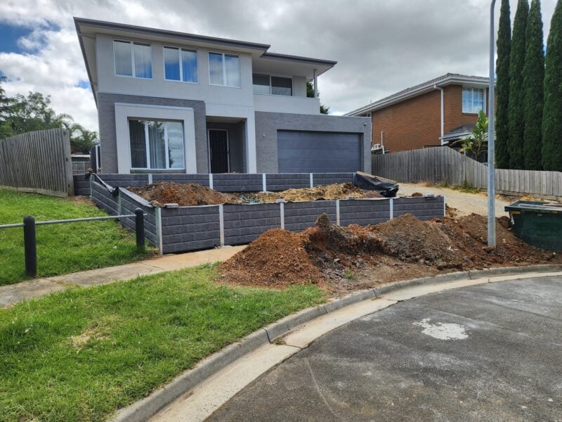 Newly Built Front Yard Retaining Wall Feature by Dream View Landscape Using Charcoal Arizona Block face Concrete Sleepers and Supplied by Sunset Sleepers
