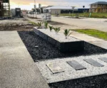 Newly Constructed Small DIY Garden Bed in Front Yard Using The Manhattan Charcoal Stacked Stone Concrete Sleeper and Finished off with Auseal EC25 Bluestone Charcoal Sealer