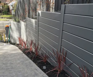Gallery 17 Painted on Plain Smooth Concrete Sleepers in The Marina Range used in Driveway Retaining Wall Project and Supplied by Sunset Sleepers