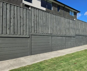 Gallery 15 Plain Marina Smooth Concrete Sleepers Used for Under Fence Plinth and Painted in Grey and Supplied by Sunset Sleepers
