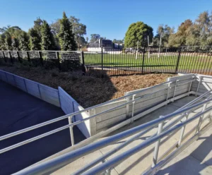 Gallery 13 Plain Smooth Concrete Sleepers in The Marina Range used in School Retaining Wall Project For Belgrave South Primary School and Supplied by Sunset Sleepers