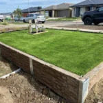 Small Front Garden with some Manhattan Jasper concrete sleepers and 40mm artificial grass Constructed by Ferguson Landscape & Design and Supplied by Sunset Sleepers