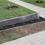 Small Front Yard Edging Retaining Wall Built Dream View Landscape Using Charcoal Marina Smooth Concrete Sleepers and Supplied by Sunset Sleepers