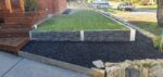 Small Front Yard Law Retaining Wall Using Charcoal Malibu Woodgrain Concrete Sleepers Built Dream View Landscape and Supplied by Sunset Sleepers