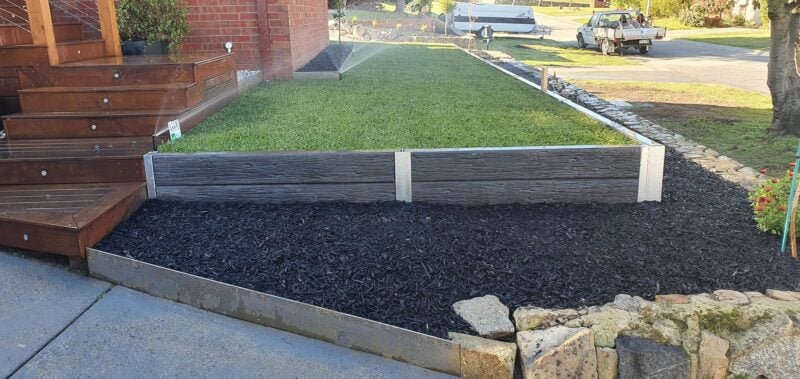 Small Front Yard Law Retaining Wall Using Charcoal Malibu Woodgrain Concrete Sleepers Built Dream View Landscape and Supplied by Sunset Sleepers