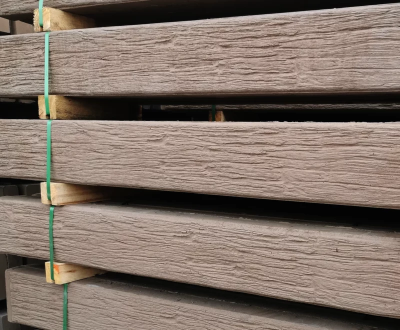 The Malibu Jasper Brown Woodgrain Concrete Sleepers Stock Waiting to be delivered on site Sunset Sleepers